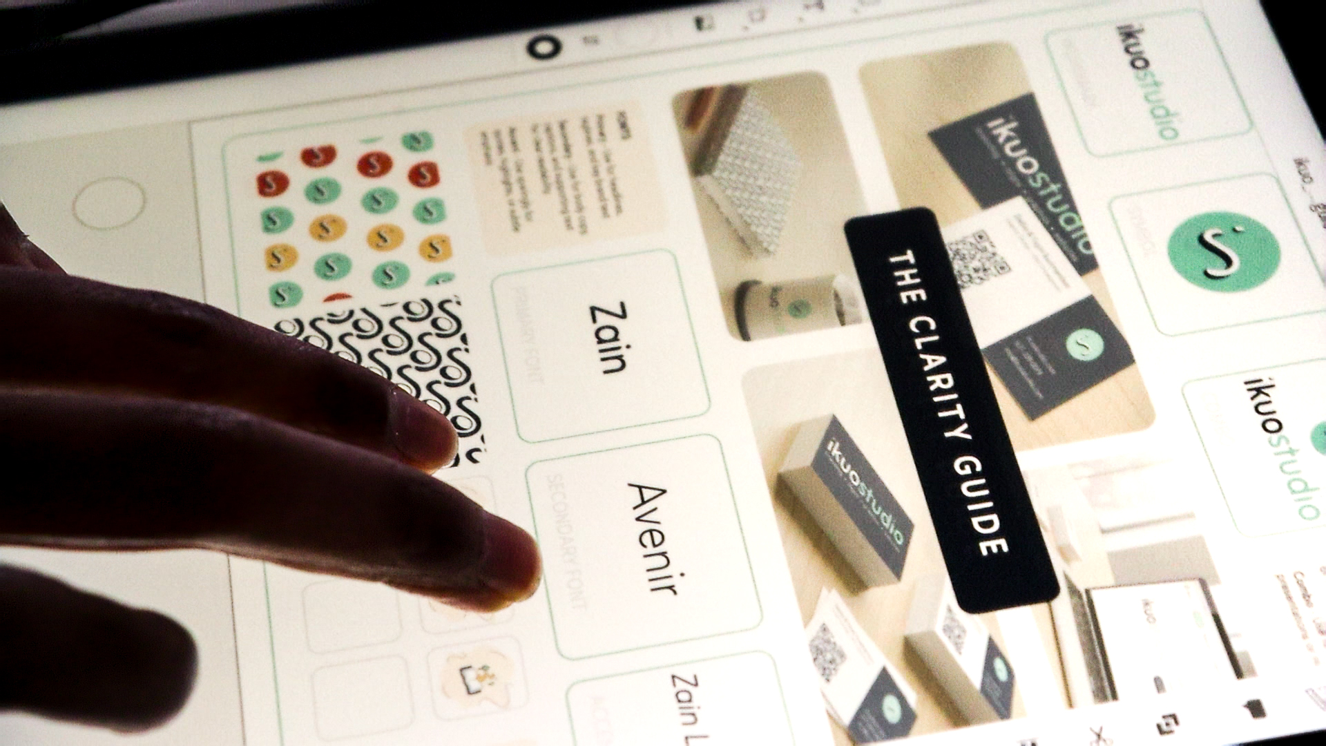 Deilia Ikuomenisan, co-founder of Ikuo Studio, looking at brand clarity guide
